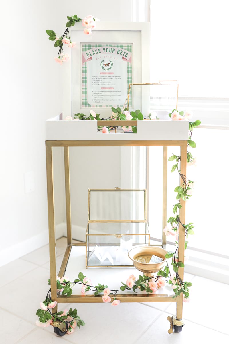 Kentucky Derby betting station with jar for wagers and printable game materials