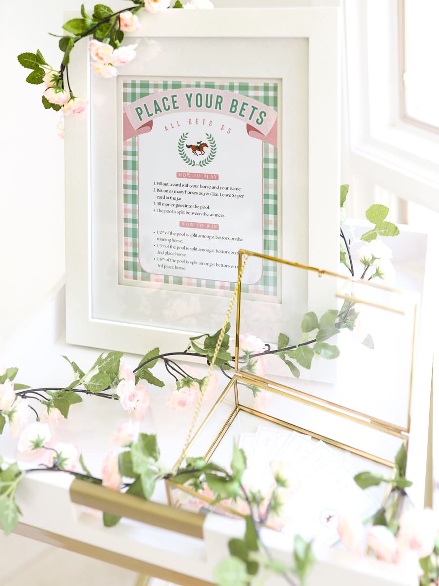 Kentucky Derby party activities setup with printable betting games and raffle station