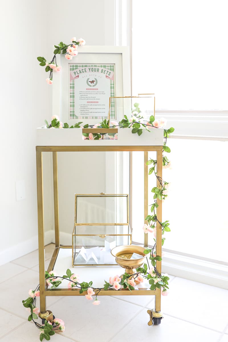 Pick-a-horse betting station with printable betting slips and cash jar for Derby party