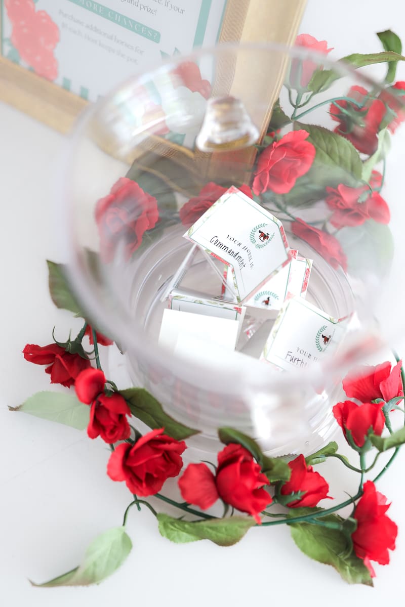 Kentucky Derby raffle slips in a bowl ready for guests to pick a horse